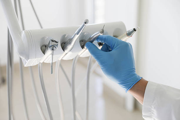 Professional Invisalign Clear Aligners technician working in Roanoke, IL